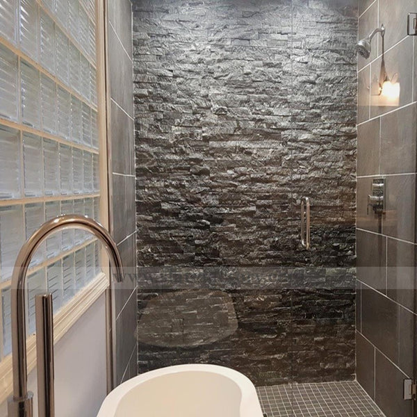 glacial black stacked stone panels shower room